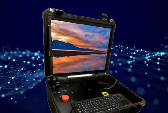 a computer in pelican case with the monitor illuminated